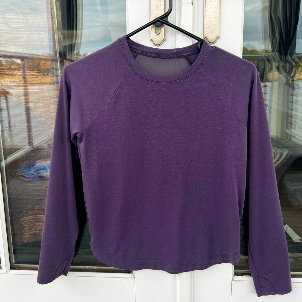 Athletic girl long sleeve shirt. Size large/12 breathable mesh back.